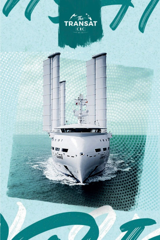 cargo sailboat under sail